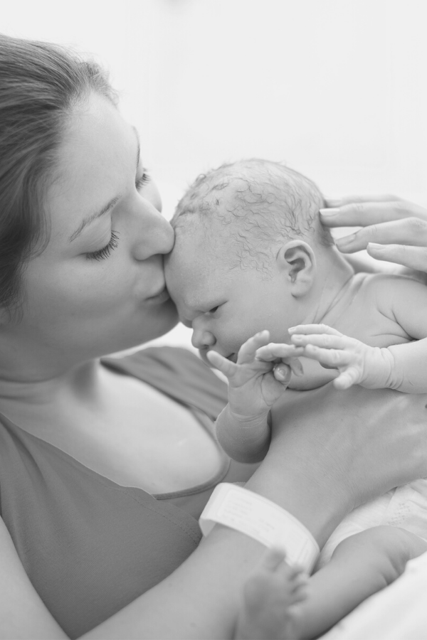 Canva Hospital Birth Mom Kissing Baby Sized for Website